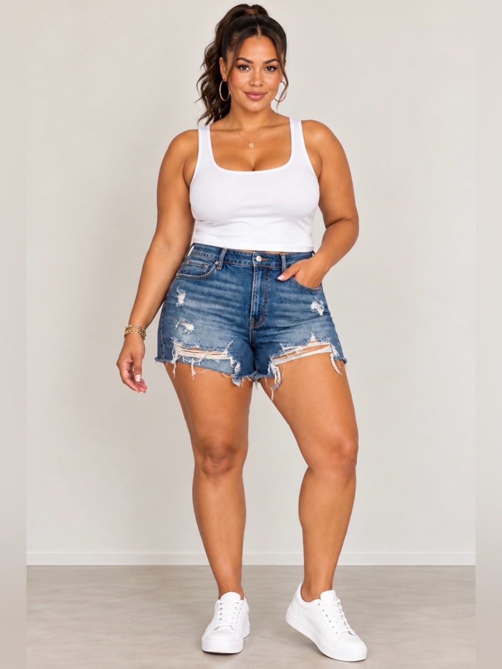Good American Distressed Mid-Blue High-Rise Jean Shorts